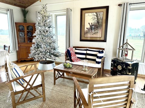 Take in the wintry landscape from the warmth of the sunroom.