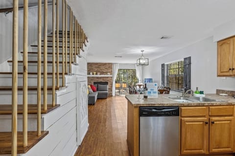 3. Open plan with kitchen, dining room, living room, and hidden reading Nook under the staircase