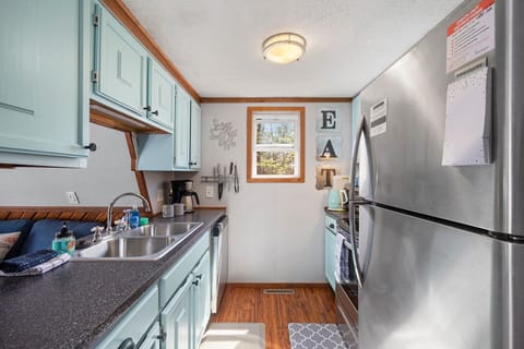 Kitchen is well equipped to make meals, SS sink w/garbage disposal, Fridge, DW,