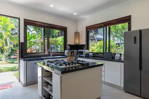 Electric kettle, highchair, cleaning supplies, paper towels