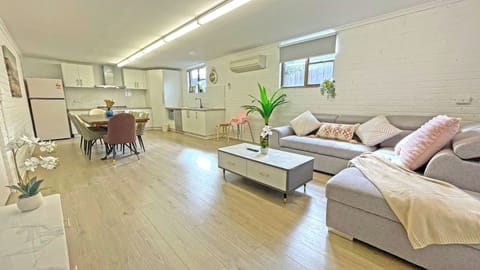 Family House | Living area | 65-inch TV with cable channels