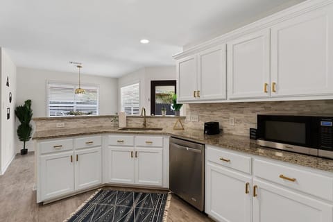 Our kitchen is fully equipped with everything you need, from pots and pans to knives, dishes, and all kinds of dishes! You can cook and make meals here.