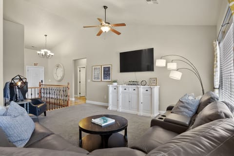 Large living room with plenty of seating.