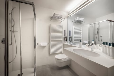 Premium Suite, Balcony | Bathroom | Separate tub and shower, rainfall showerhead, free toiletries