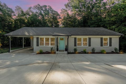 Front home with circular driveway