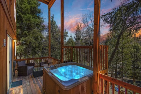 End the day soaking in your private hot tub as the sunset glows through the peaceful Big Bear forest—your perfect mountain escape after a day of adventure.