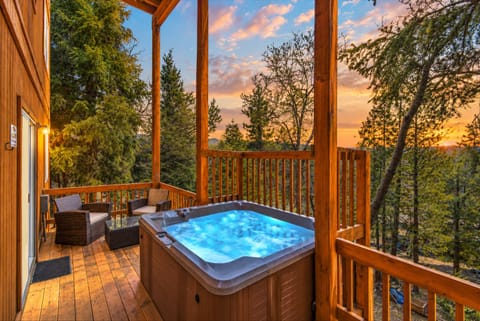 Slip into the private hot tub as sunset filters through the trees—a peaceful, tucked-away spot to soak, reconnect, and end the day outdoors.