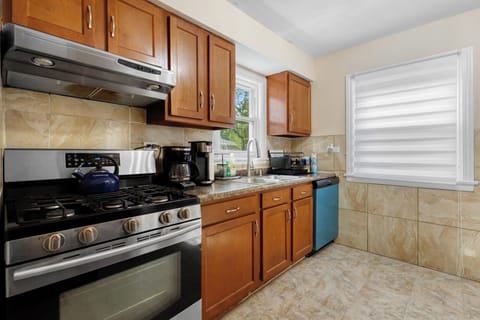 Kitchen with coffee machines and dishwasher
