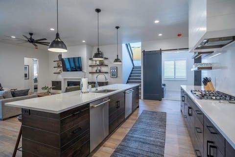 Kitchen is fully stocked with appliances and utensils to make mealtime a breeze