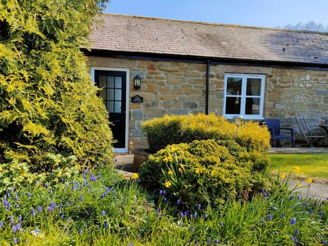 Forge Cottage - front entrance with Pele Tower views