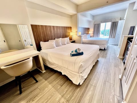 Premium Hotel room, two king beds, kitchenette, Wi-Fi, desk, Full Tile Bath