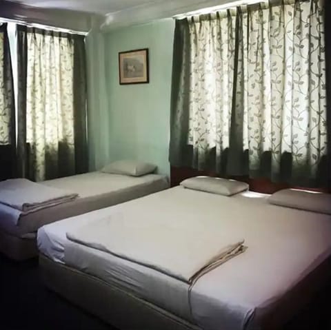 Deluxe Triple Room | Bed sheets