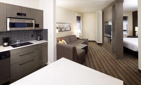 Studio, 1 King Bed (Corner) | Living room | Flat-screen TV