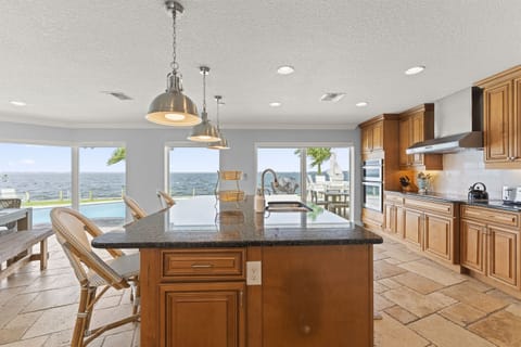 Well appointed kitchen with island bar seating