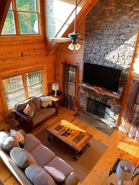 Main living room with two story fireplace