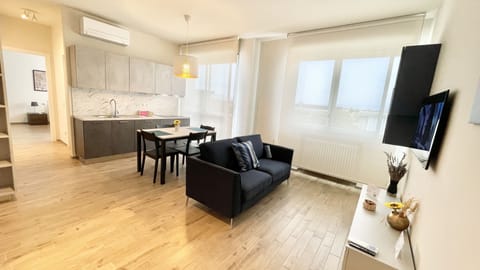 Comfort Apartment, 1 Bedroom, Non Smoking | Living area | 45-inch Smart TV with digital channels