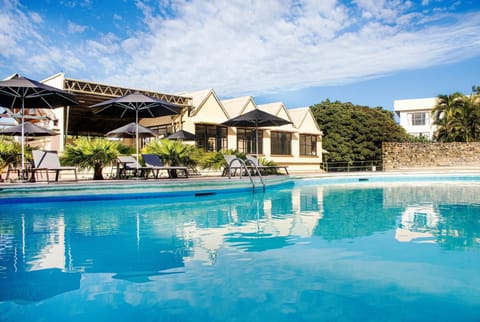 Outdoor pool, open 10:00 AM to 7:00 PM, pool umbrellas, sun loungers
