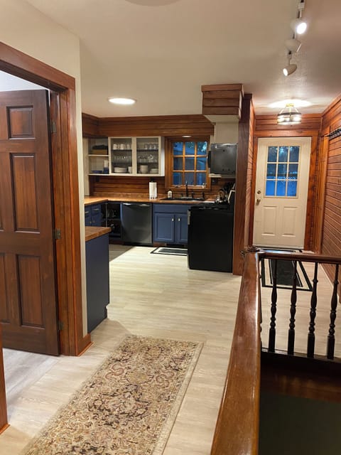 Entry into home from deck area into kitchen.