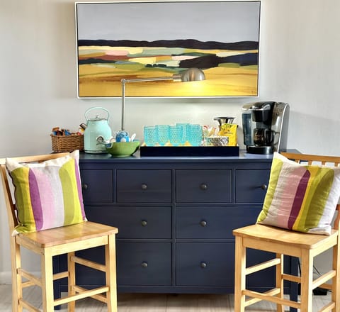 Adjacent to kitchen is our coffee and tea bar, equipped with great guest goodies