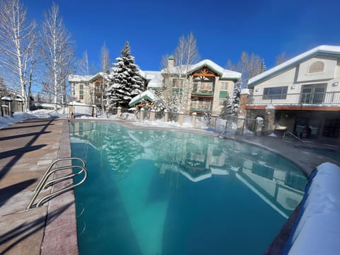 The pool, with the Spa condo in the background (L) & amenities building (R)