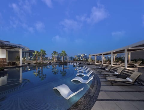 2 outdoor pools, open 6:30 AM to 8:00 PM, pool umbrellas, sun loungers