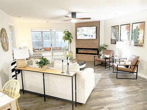 Beautiful living rm: SMART TV, electric fireplace, coffee bar, sunrm, dining rm