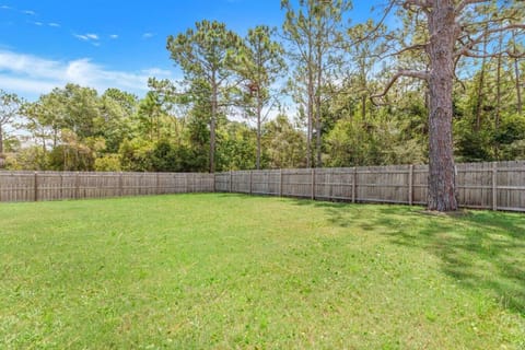Fully fenced-in backyard, recently added a firepit
