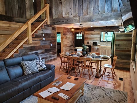 Great room. Three recliners in sofa