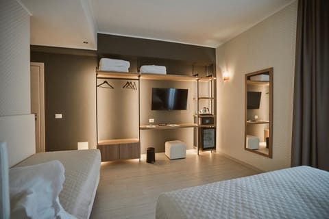Deluxe Triple Room | Premium bedding, down comforters, in-room safe, desk