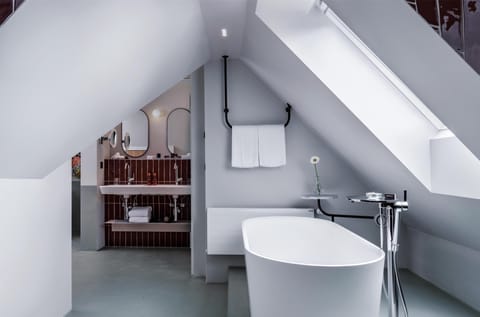 Shower, rainfall showerhead, designer toiletries, hair dryer