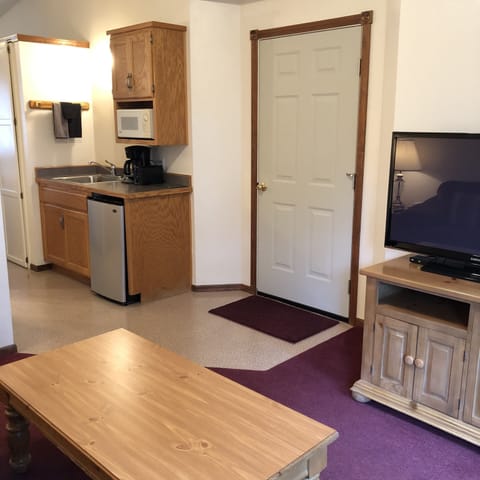 Room #5 - Deluxe King Suite with River View (2nd Floor) | Private kitchenette | Mini-fridge, microwave, freezer