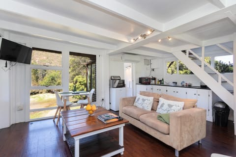 Deluxe Cabin | Living area | TV