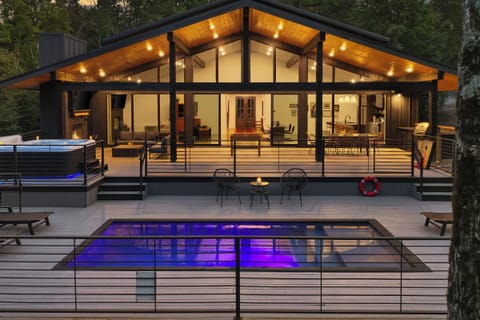 Outdoor Oasis: Unwind by the shimmering pool, soak in the hot tub, and enjoy stunning views!
