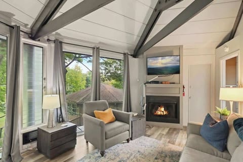 Experience the ultimate in slope-side comfort in our living room. After a day on the slopes, unwind by the fire with breathtaking views right from your cozy haven.