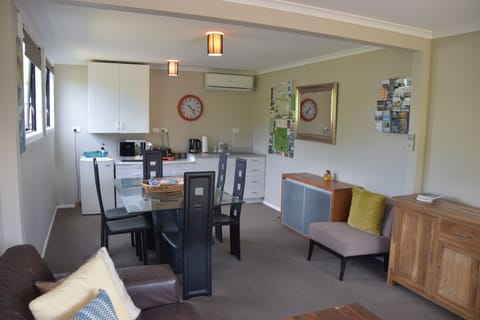 32-inch flat-screen TV with digital channels, TV, iPod dock