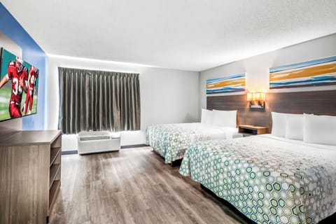 Desk, laptop workspace, blackout drapes, iron/ironing board