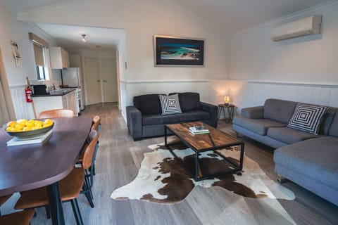 Premier Apartment, 2 Bedrooms | Living area | 20-inch flat-screen TV with digital channels, TV, table tennis