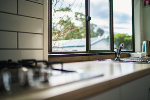 Family Budget Cabin (Sleeps 4) | Private kitchen | Shared fridge, microwave