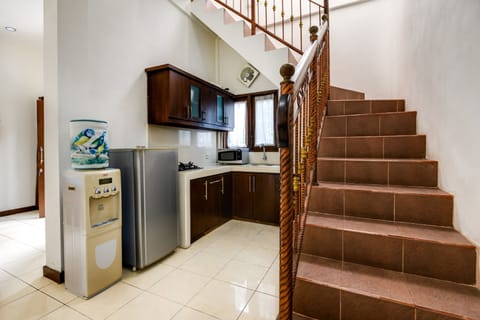 Apartment, 2 Bedrooms | Private kitchen | Full-size fridge, microwave, coffee/tea maker, electric kettle