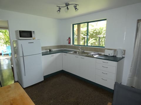 Apartment | Private kitchen | Full-size fridge, microwave, stovetop, electric kettle