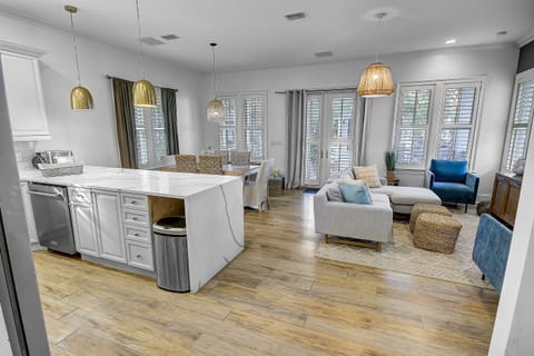 Gourmet Kitchen-Step into our beautiful gourmet kitchen, plenty of natural light and fully stocked with vacation essentials. Stainless steel appliances amidst the coastal design and plenty of kitchenware to meet your needs.