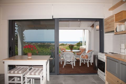 Suite, 2 Bedrooms, Sea View (Thymari) | Living area | 26-inch flat-screen TV with satellite channels, TV