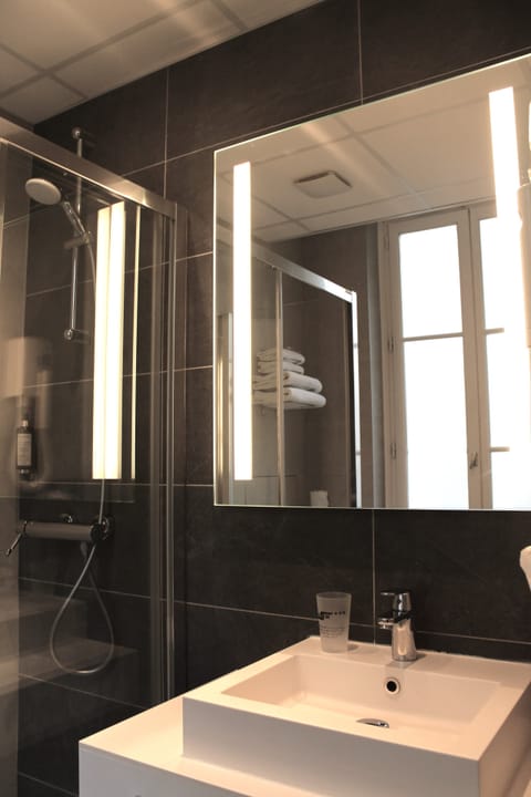 Shower, free toiletries, hair dryer, towels