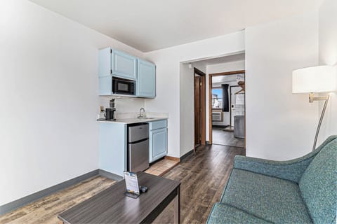 Comfort Suite, 1 Queen Bed with Sofa bed, Balcony, Pool View | Living area | 0-inch flat-screen TV with cable channels