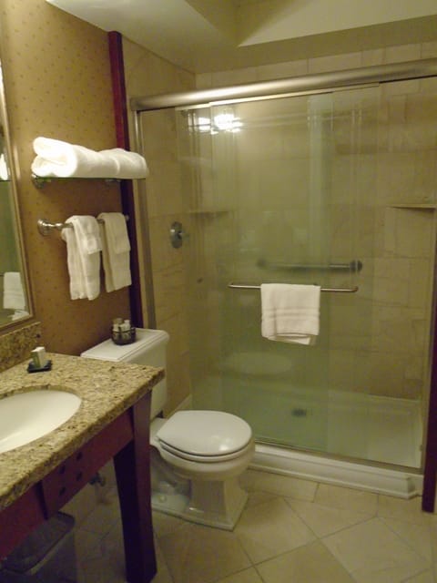 Combined shower/tub, designer toiletries, hair dryer, bathrobes