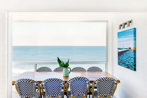 Absolute Oceanfront - Yamba Accommodation - Air-conditioned dining room ocean views.