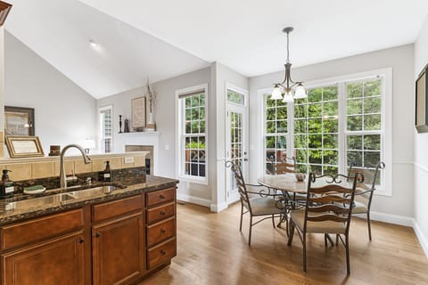 The breakfast nook is right off the kitchen.