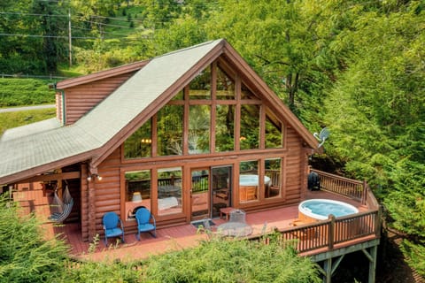 Enjoy breathtaking mountain vistas from the wrap-around deck.