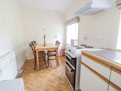 Fridge, electric kettle, toaster, cookware/dishes/utensils