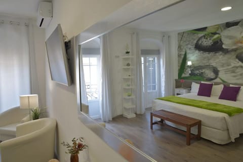 Standard Suite, City View | In-room safe, desk, soundproofing, iron/ironing board